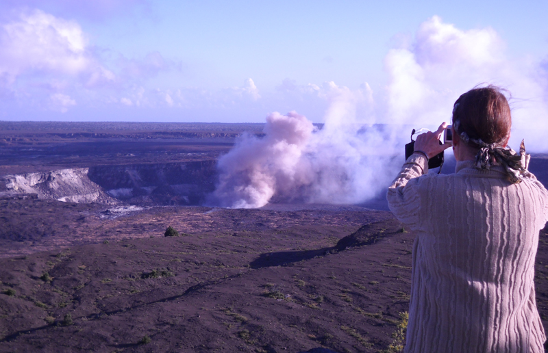 Brown ash and fumes billow out of the new vent in the summit crater