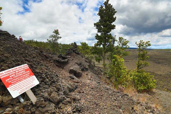 Warning sign at Nāpau Crater rim