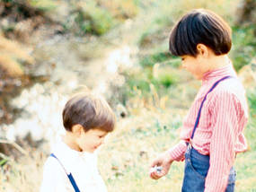 Two boys making a discovery.