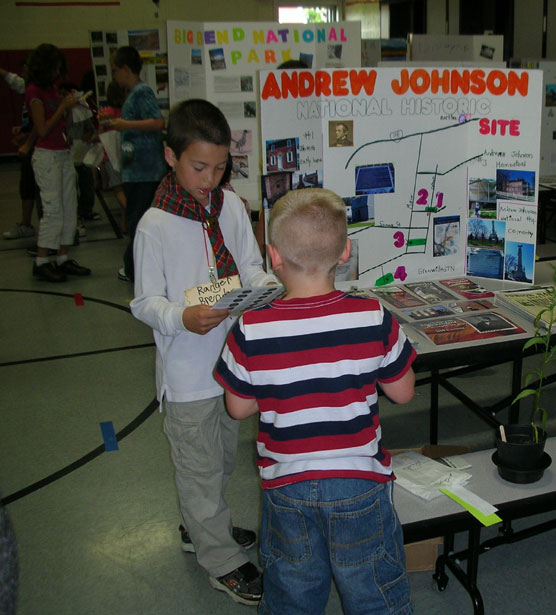 Elementary school students with national park displays.