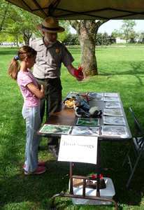 Kids learn how to identify bird songs at the Bird Day event.
