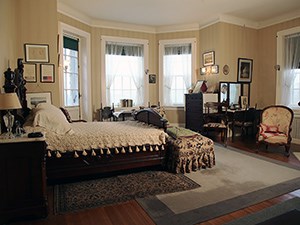 A bedroom with bay window.