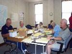 Volunteers Check Lab Results