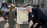 Reenactor Jackson signs enlarge act