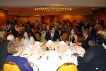 Japanese visitors at table with white tablecloth