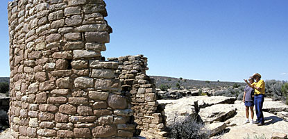 Hikers visit Tower Point Ruin on the Square Tower Group trail