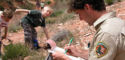 A volunteer working with the outdoor education program