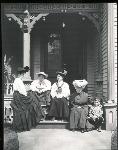Group on porch of 219 N. Delaware - HSTR 28928