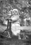Margaret Truman being pulled on cart.
