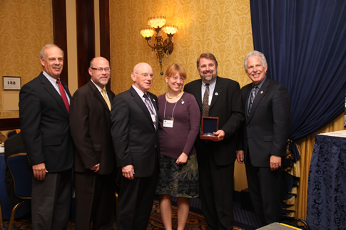 Members and Staff of the Ice Age park and Trail Foundation are presented the Hartzog Award by Acting Secretary of the Interior.