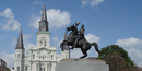 St. Louis Cathedral and a statue of Andrew Jackson on his horse in New Orleans' Jackson Square