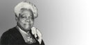 Mary McLeod Bethune wearing the Commander of the Order of the Star of Africa medal.