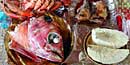 Lobster, shrimp, fish, and breadfruit—a sumptuous meal of local village subsistence resources