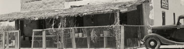 Chata's Place, 1936- the sign over the porch reads: we serve REAL Mexican food at reasonable prices.