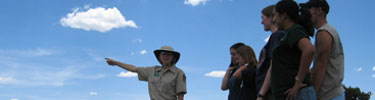 Color photograph of intern Jessica Albrecht giving talk to visitors