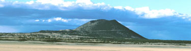 color photograph of plains with Capulin Volcano is distance