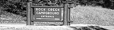 Wooden entrance sign to the Rock Creek Campground