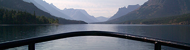 The bow of The International with Goat Haunt in the distance