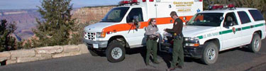 Rangers on rim with ambulance and patrol vehicle