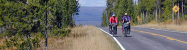 Bikers ride along the John Day Rockefeller, Jr. Parkway.