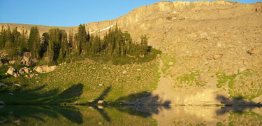 Sunset Lake on the Teton Crest Trail with reflection.