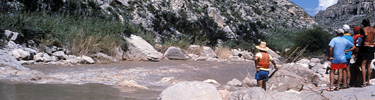 Scouting the Hot Springs rapids in the Lower Canyons