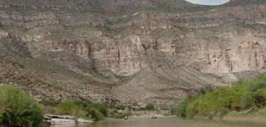 The Lower Canyons dwarf two canoes