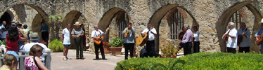 Mariachis perform after church service at Mission San José