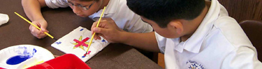 Students creating frescos