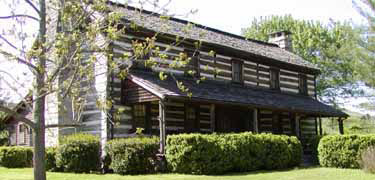 View of two-story chinked log home, John Brown Tavern, on the route of the Bell and Drane detachments, Chattanooga, Tennesee