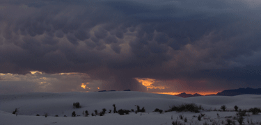 heavy storm clouds over the dunes