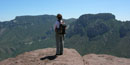 A lone hiker at the top of the Lost Mine Trail A lone hiker at the top of the Lost Mine Trail