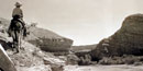 Horseback rider in Tornillo Creek, 1930s