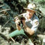 Wildlife biologist with bear cub