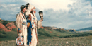 Robert and Dorothy Yellowtail traditionally dressed in the land of the Bighorn