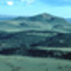 color photograph of mesa with mountain in background color photograph of mesa with mountain in background