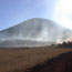 Color photo of Capulin in smoke haze.