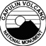 Black and white drawing of volcano with sun rising