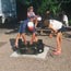 Campers starting a campfire