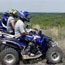 ATV riders in safety gear