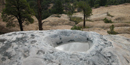 Image of tinaja on mesa top at El Morro National Monument