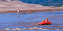 Children rafting Medano Creek Children rafting Medano Creek