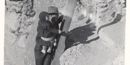 Visitor climbs ladder to MOCA in 1946