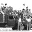 Civilian Conservation Corps group waves to camera