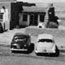 1950s cars parked in front of the inn