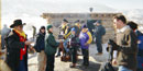 Modern-day Pony Express riders greet people from around the world at the 2002 Winter Olympics.