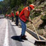 a photo of road hogs working on culverts and ditches a photo of road hogs working on culverts and ditches
