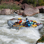 Rafters plunge into rapids on the Green River
