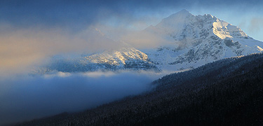 Gunsight Mtn, clouds, and snow