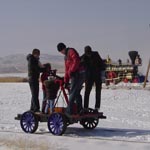 Handcar being pumped down the tracks